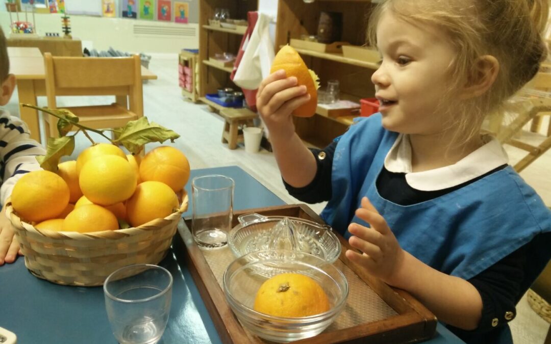The children of the blue class get vitamins 🍊